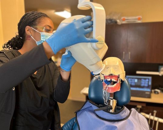 Dental assistant student training at Austin Dental Assistant School