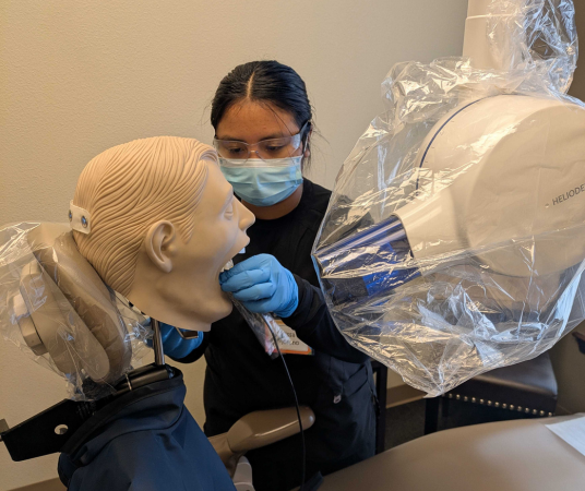 Dental assistant student training at Austin Dental Assistant School